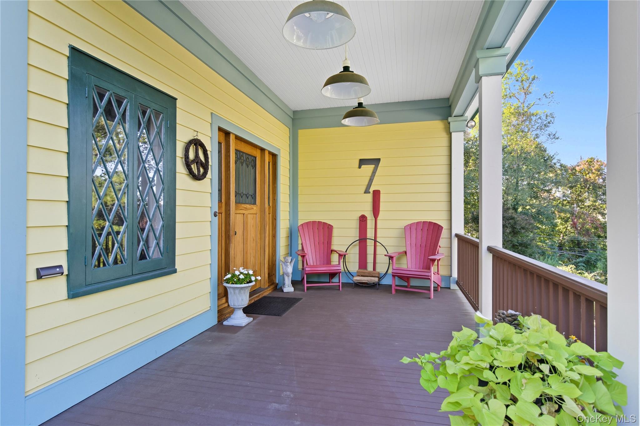 7 Landing Road Huntington, NY 11743 - Photo 6 of 42 a view of a chairs and table in the balcony