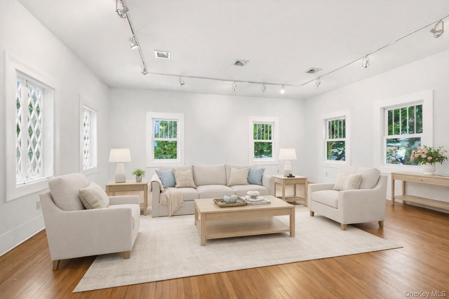 7 Landing Road Huntington, NY 11743 - Photo 8 of 42 a living room with furniture and a large window