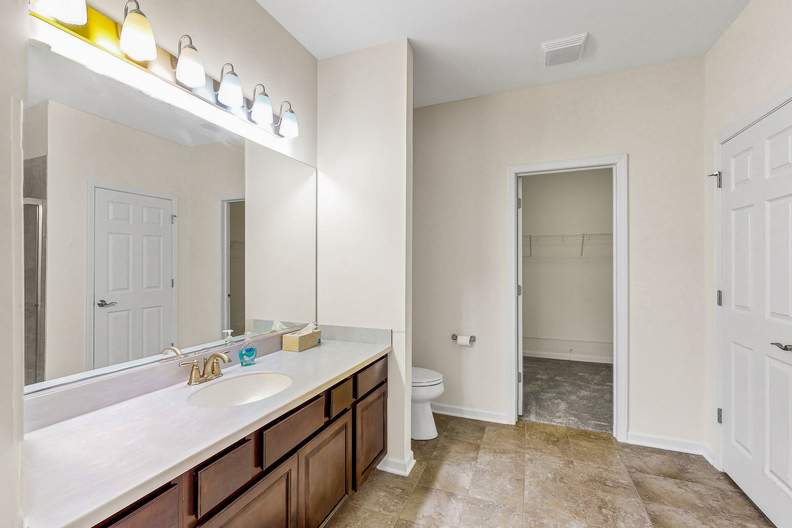 731 Windett Ridge Road Yorkville, IL 60560 - Photo 13 of 28 a bathroom with a sink double vanity and a mirror