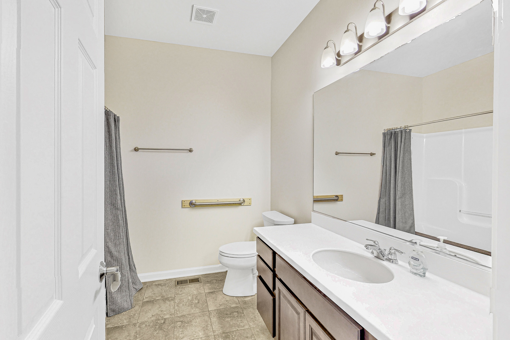 731 Windett Ridge Road Yorkville, IL 60560 - Photo 19 of 28 a bathroom with a sink and mirror with toilet