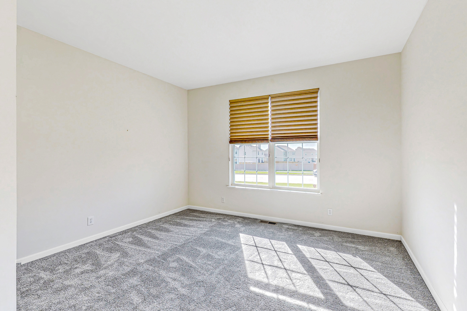 731 Windett Ridge Road Yorkville, IL 60560 - Photo 20 of 28 a view of an empty room with a window