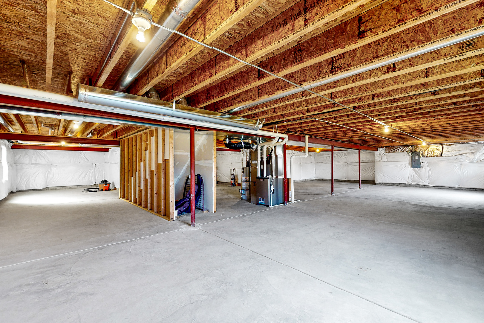 731 Windett Ridge Road Yorkville, IL 60560 - Photo 25 of 28 a view of an empty room with wooden roof