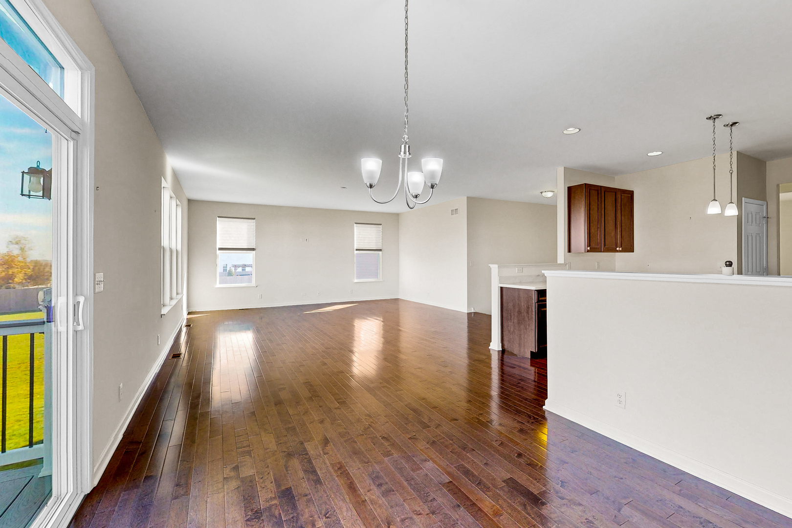 731 Windett Ridge Road Yorkville, IL 60560 - Photo 7 of 28 a view of a room with wooden floor and staircase