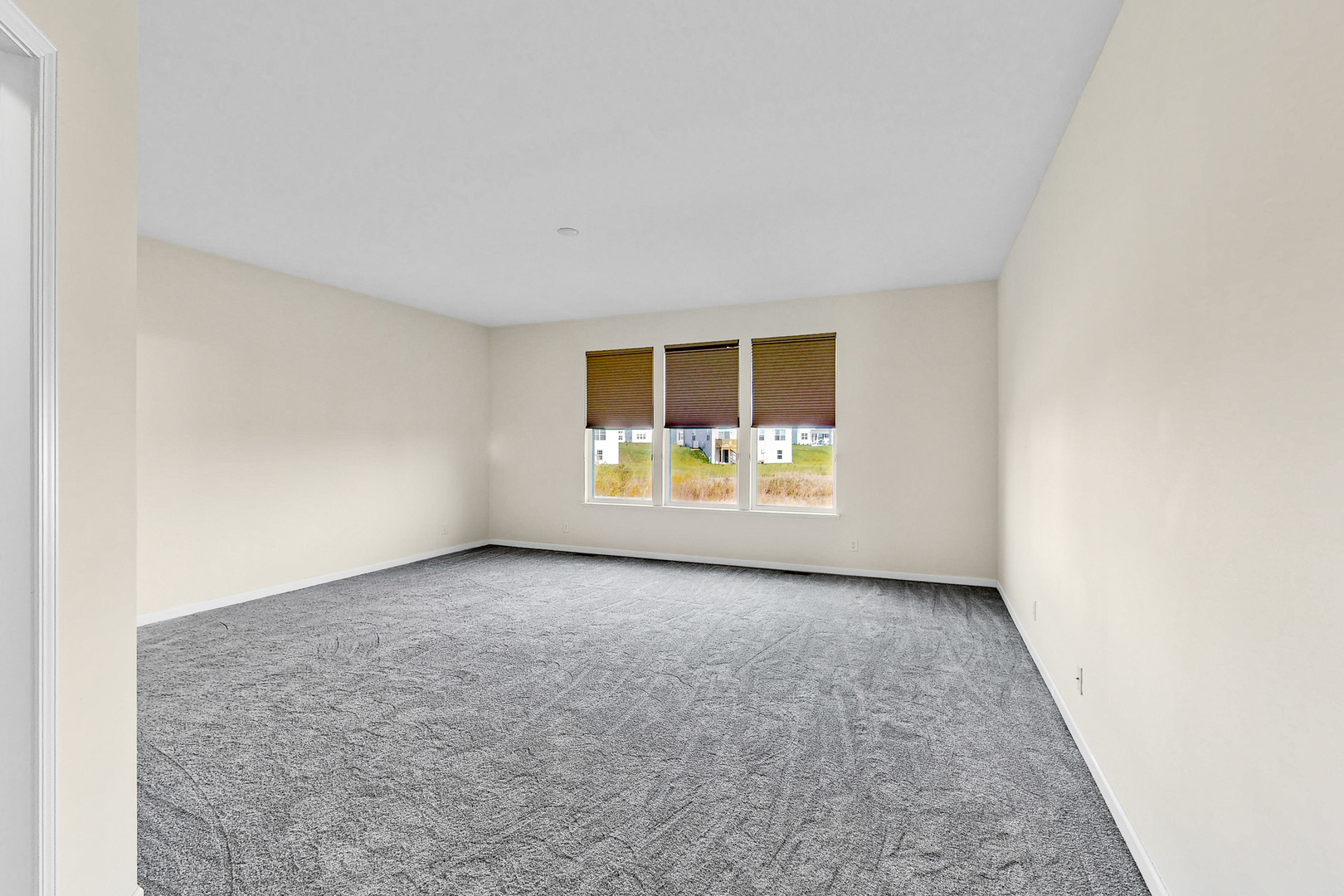 731 Windett Ridge Road Yorkville, IL 60560 - Photo 10 of 28 an empty room with a window