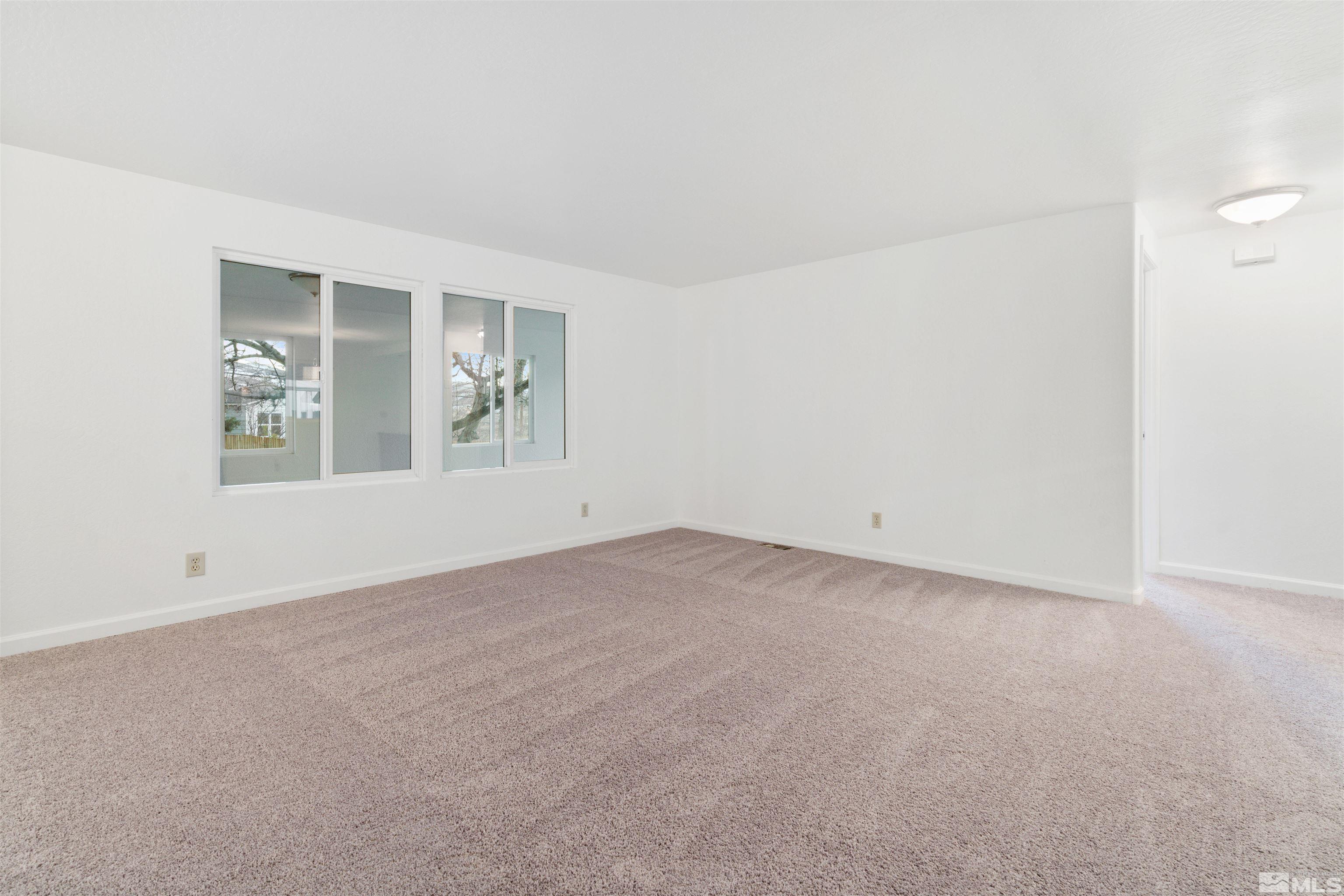 210 Zircon Drive Reno, NV 89521 - Photo 20 of 35 an empty room with windows