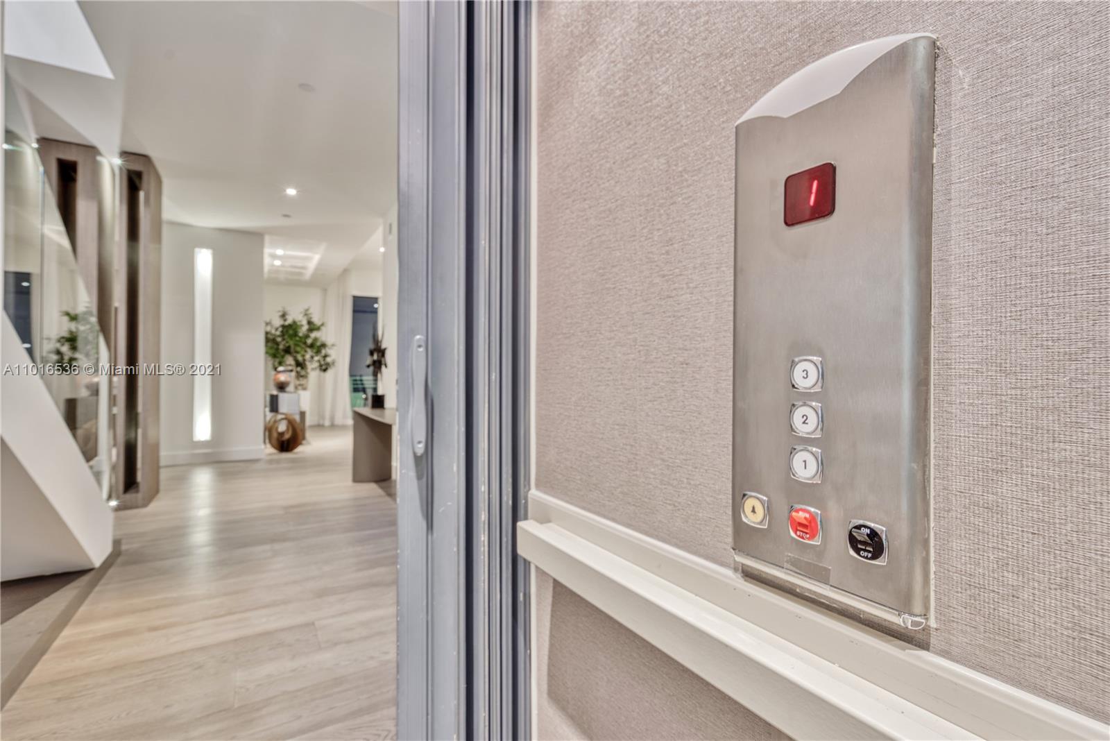 900 Brickell Key Boulevard, Unit PH4 Miami, FL 33131 - Photo 30 of 79 a view of a hallway and a livingroom with furniture