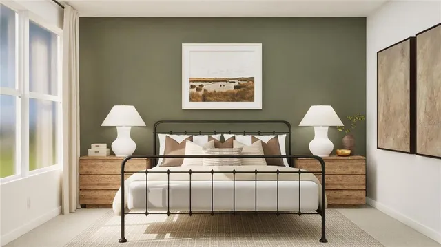 a bedroom with bed and window