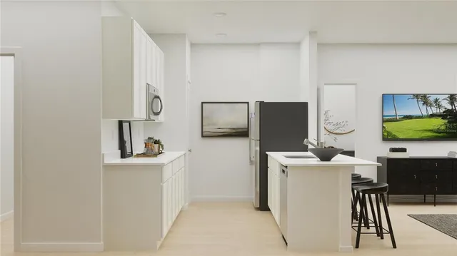 a workspace with furniture and mirror