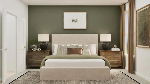 a bedroom with a large bed and a window