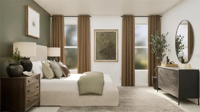 a bedroom with furniture and a mirror