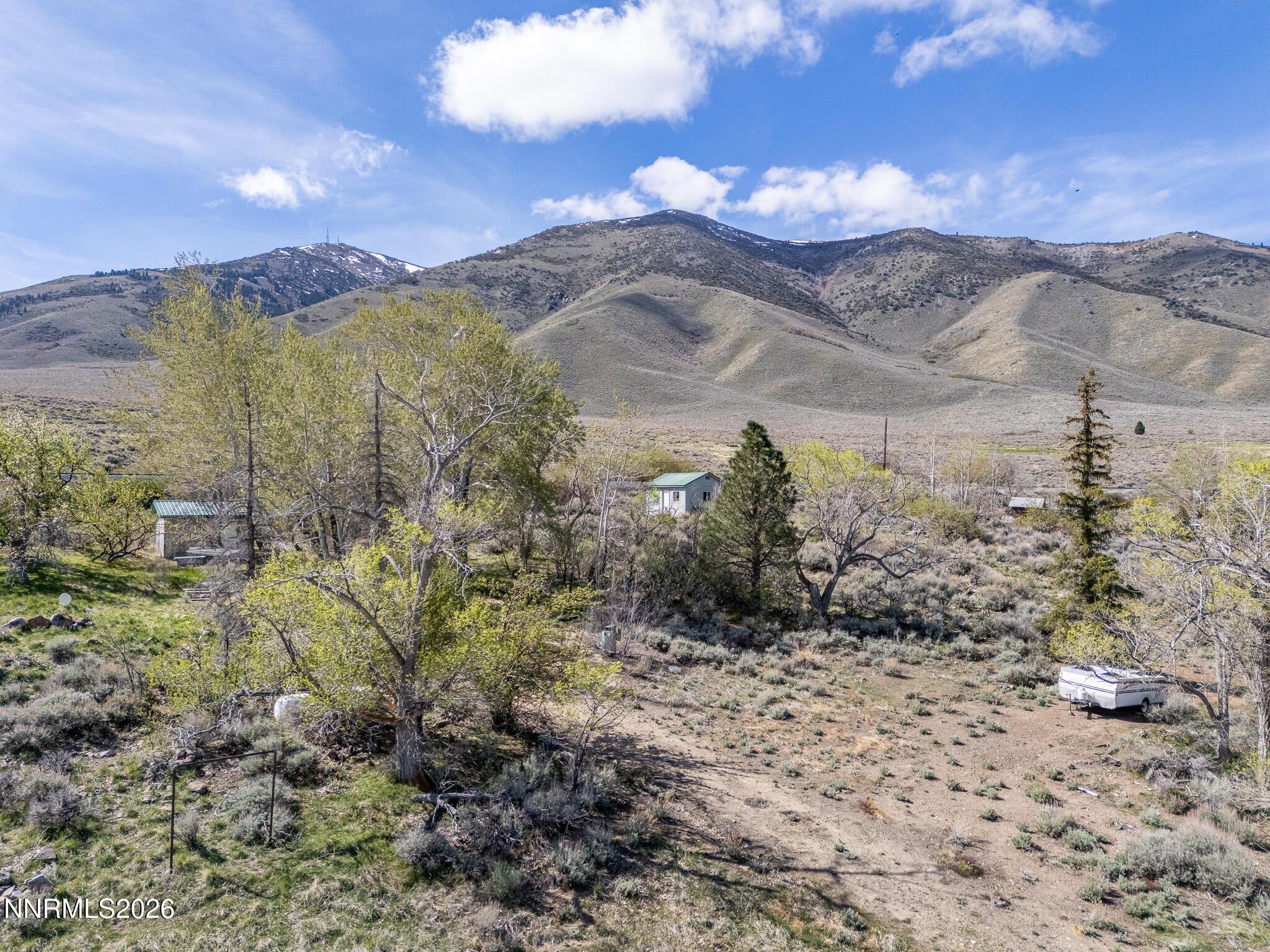 11000 Duffney Lane Reno, NV 89506 - Photo 10 of 24 a view of a yard with mountains in the background