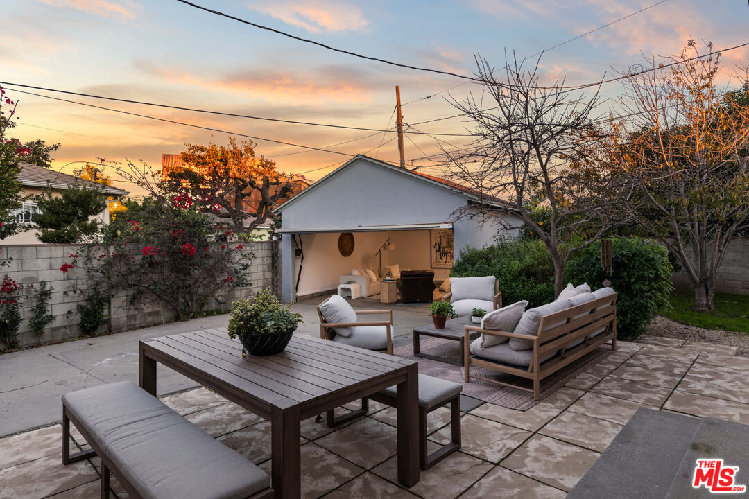 3344 Delaware Avenue Santa Monica, CA 90404 - Photo 4 of 28 a view of a patio with couches table and chairs and potted plants