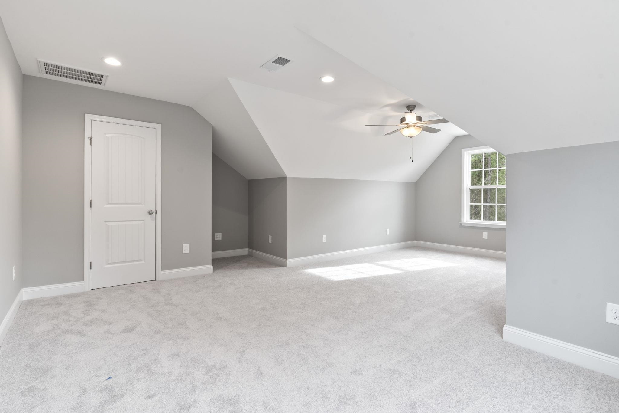 565 Timber Creek Drive Loris, SC 29569 - Photo 24 of 37 Bonus room featuring light carpet, vaulted ceiling, recessed lighting, and ceiling fan