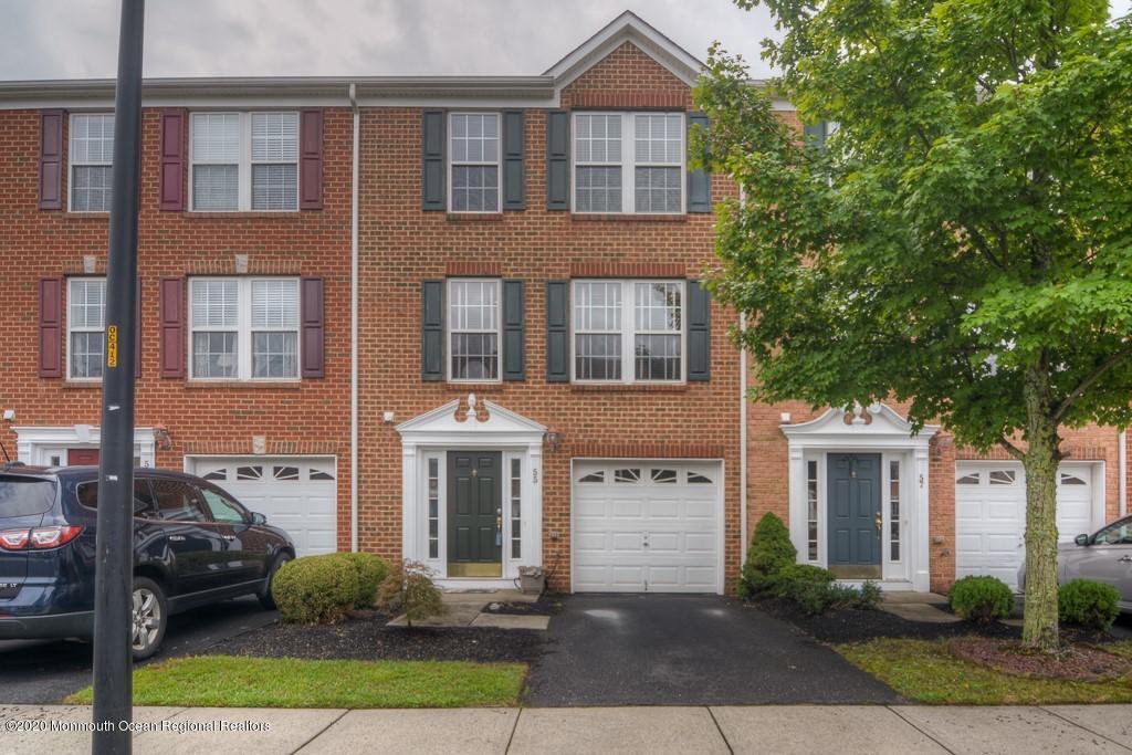 55 Saxton Road Farmingdale, NJ 07727 - Photo 1 of 23 a front view of a house with yard and parking