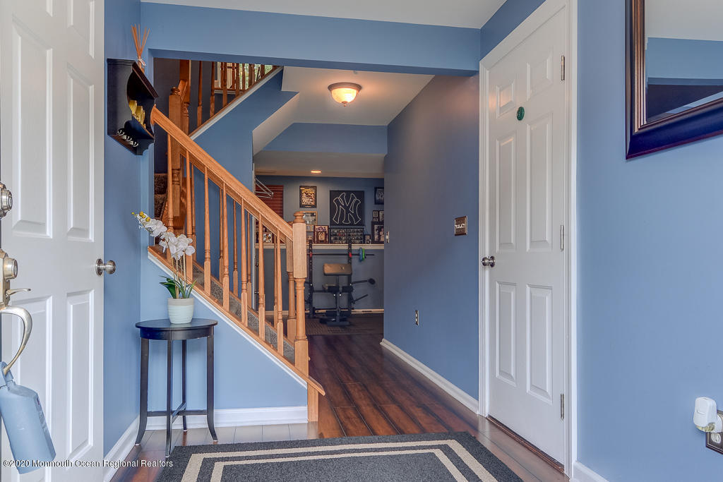 55 Saxton Road Farmingdale, NJ 07727 - Photo 2 of 23 a view of entryway and hall with wooden floor
