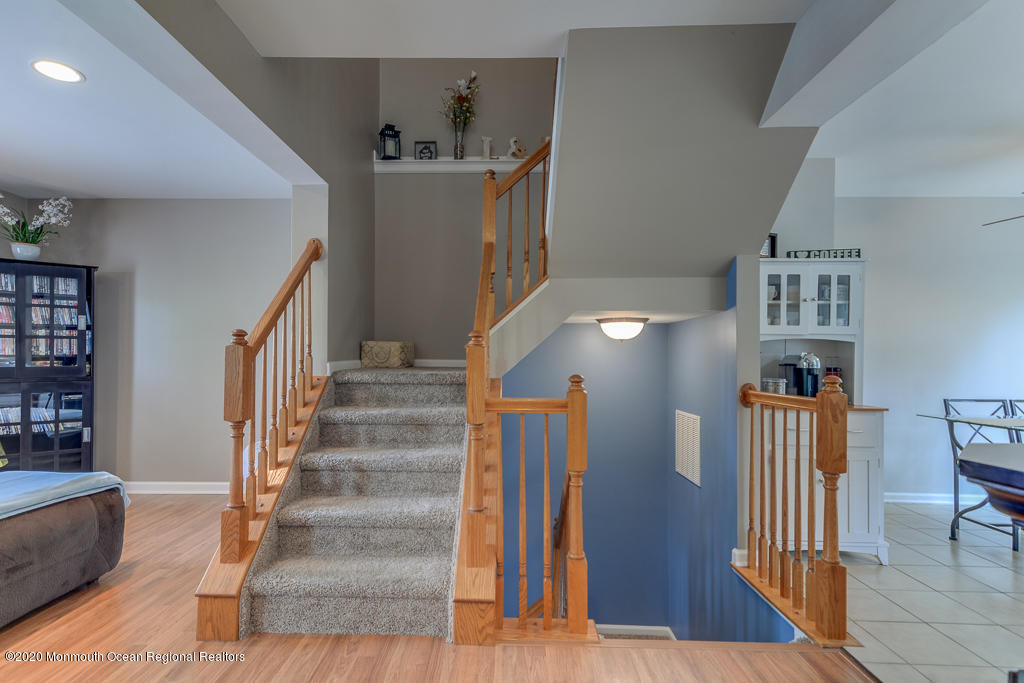 55 Saxton Road Farmingdale, NJ 07727 - Photo 13 of 23 a view of entryway and hall with wooden floor