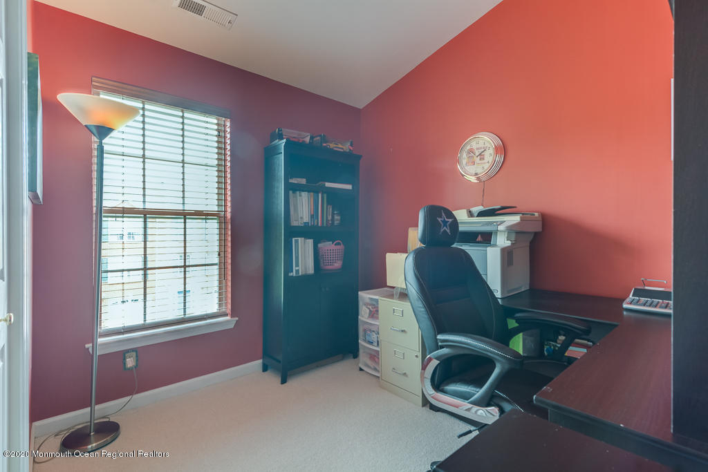 55 Saxton Road Farmingdale, NJ 07727 - Photo 19 of 23 a room with furniture and a window