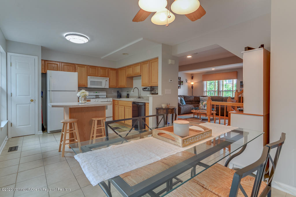 55 Saxton Road Farmingdale, NJ 07727 - Photo 8 of 23 a view of a dining room kitchen and a window
