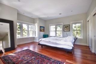 7 Erlinda Road Truro, MA 02666 - Photo 12 of 19 a spacious bedroom with a large bed and a window