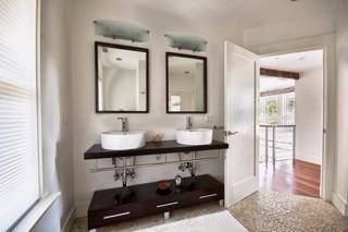 7 Erlinda Road Truro, MA 02666 - Photo 16 of 19 a bathroom with a sink a mirror and a toilet