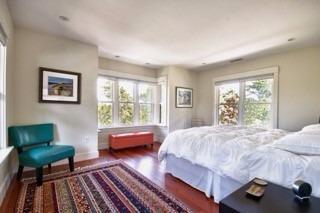 7 Erlinda Road Truro, MA 02666 - Photo 17 of 19 a bedroom with a bed and large windows