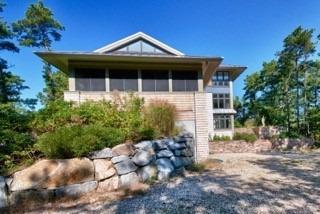 7 Erlinda Road Truro, MA 02666 - Photo 2 of 19 a front view of a house with a yard
