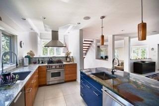 7 Erlinda Road Truro, MA 02666 - Photo 5 of 19 a kitchen with stainless steel appliances granite countertop a sink a stove and a wooden floor