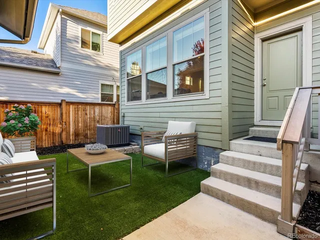 an aerial view of residential houses and city view