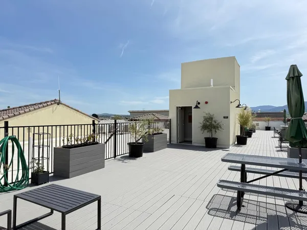 a view of a terrace with seating area
