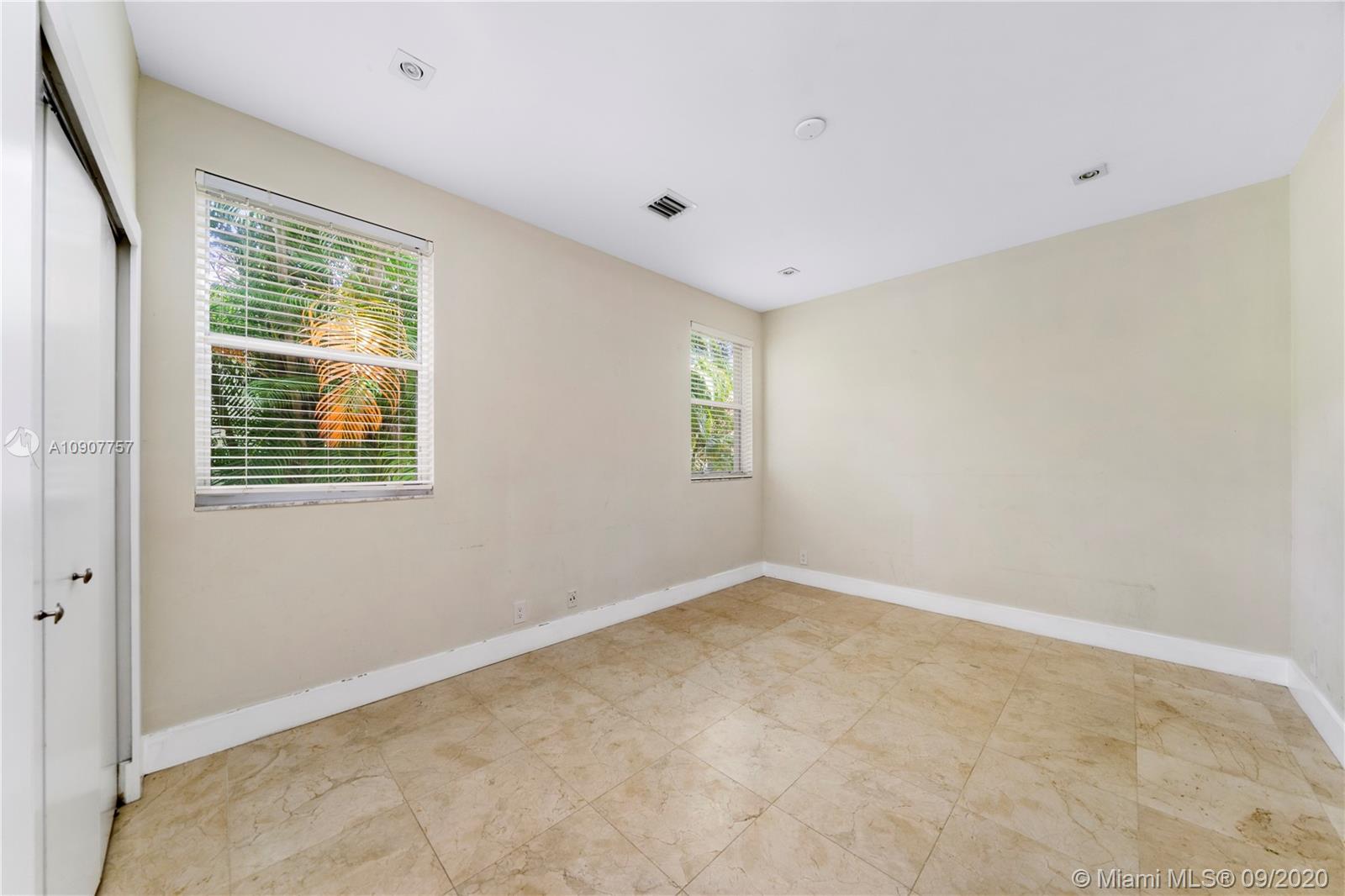 2467 Eagle Run Drive Weston, FL 33327 - Photo 16 of 33 a view of an empty room with a window