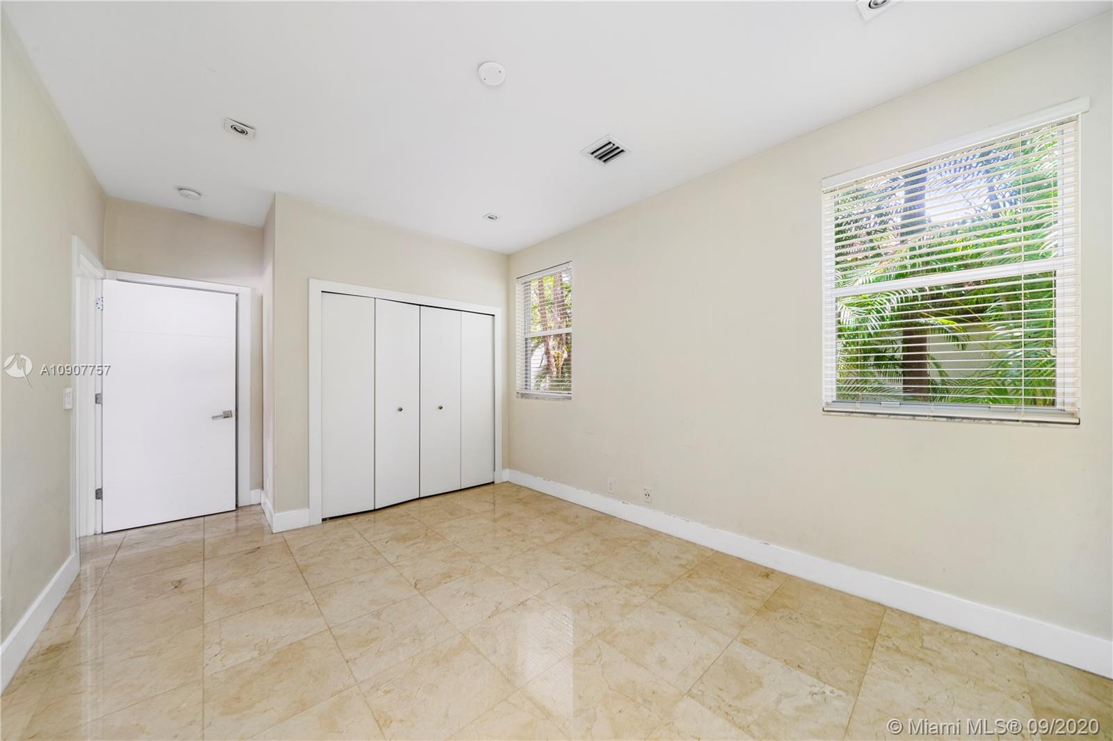 2467 Eagle Run Drive Weston, FL 33327 - Photo 17 of 33 a view of an empty room with a window