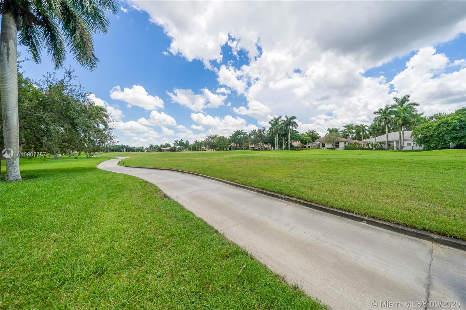 2467 Eagle Run Drive Weston, FL 33327 - Photo 28 of 33 a view of a golf course with a big yard