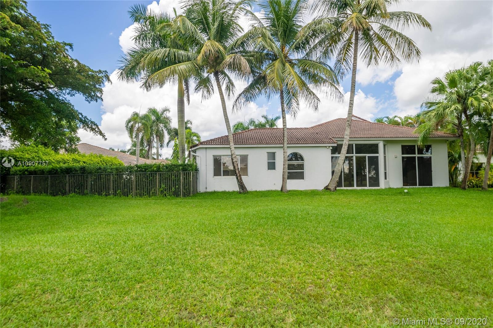 2467 Eagle Run Drive Weston, FL 33327 - Photo 29 of 33 a view of a house with a backyard