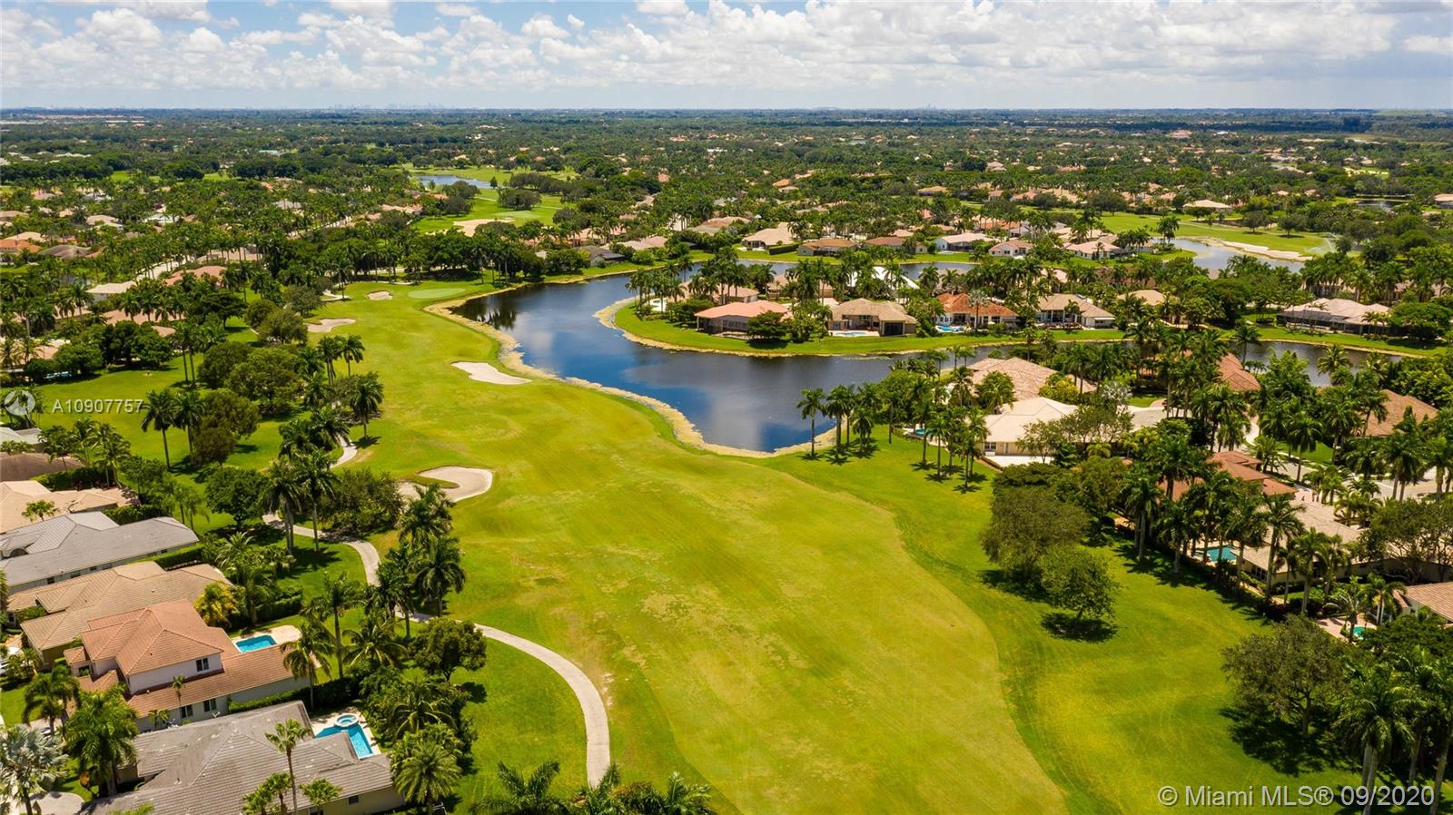 2467 Eagle Run Drive Weston, FL 33327 - Photo 31 of 33 an aerial view of residential houses with outdoor space