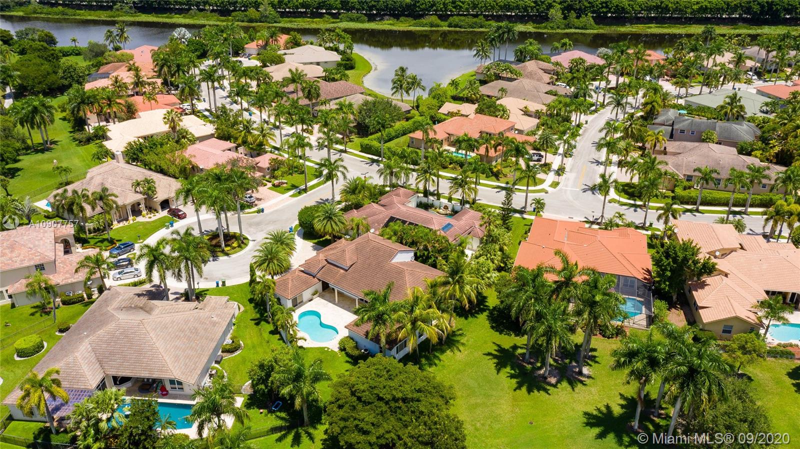 2467 Eagle Run Drive Weston, FL 33327 - Photo 32 of 33 an aerial view of lake residential house with outdoor space and lake view