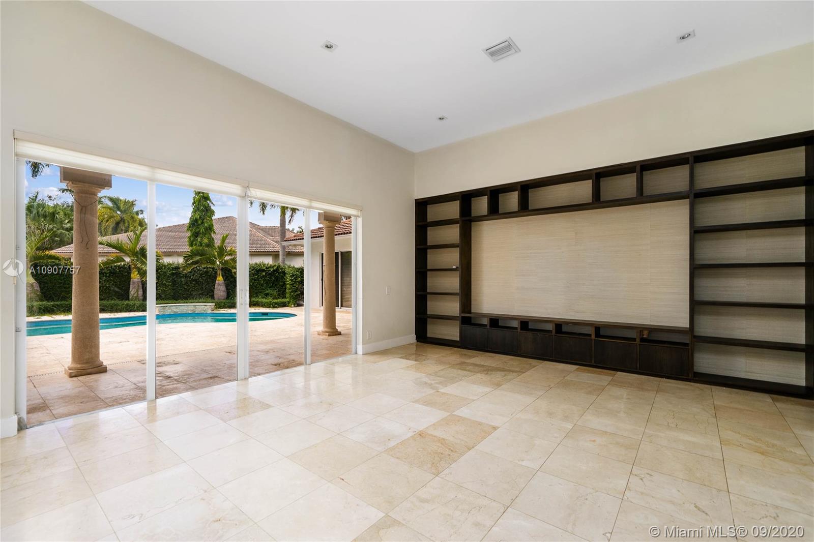 2467 Eagle Run Drive Weston, FL 33327 - Photo 6 of 33 a view of an empty room with windows