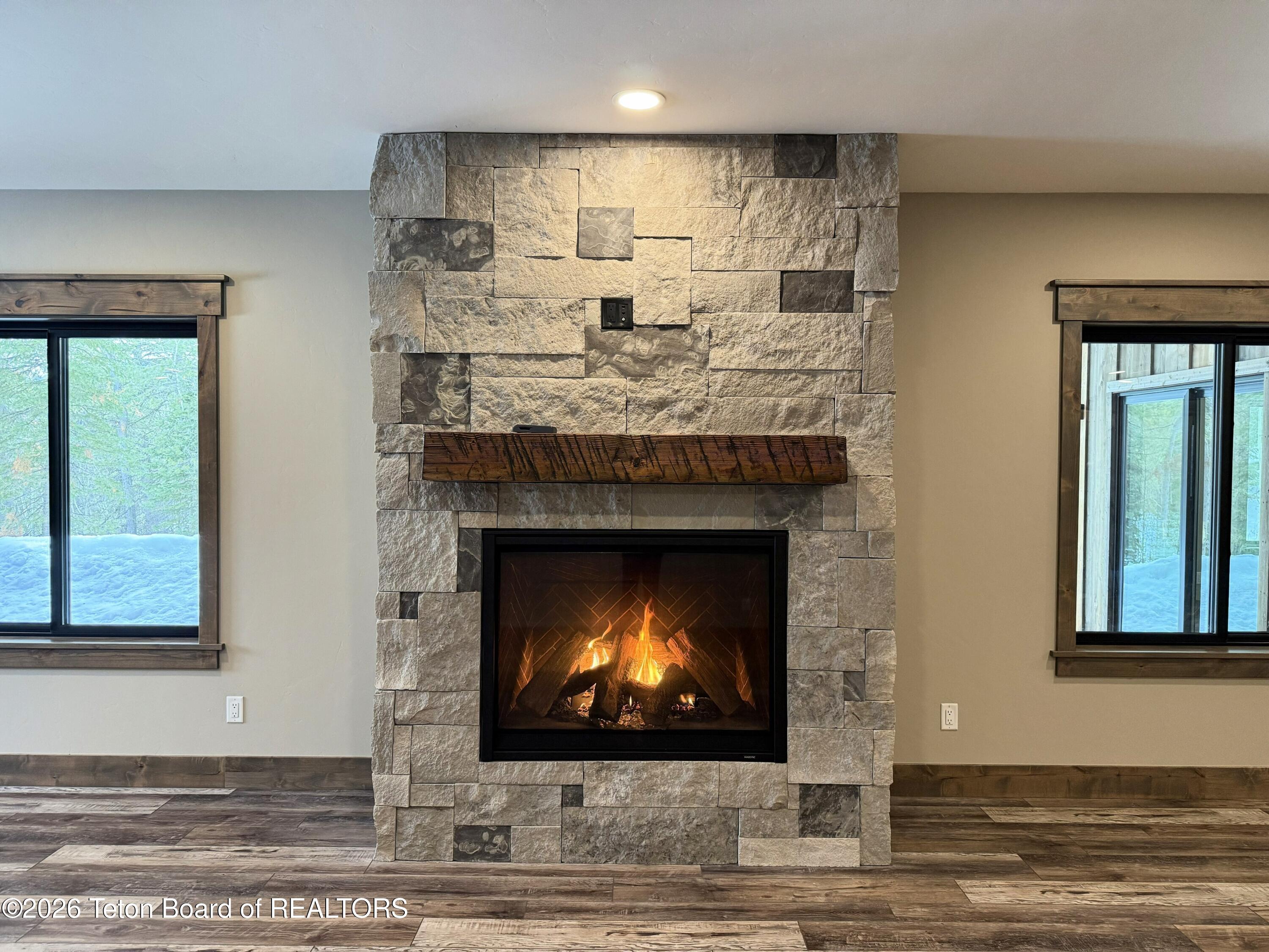 5727 Forest Ridge Road Victor, ID 83455 - Photo 53 of 76 Lower Level Gas Fireplace