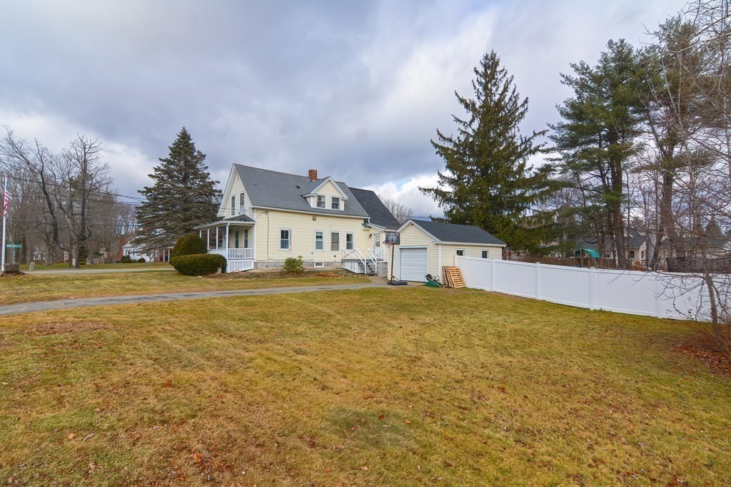 103 Maple Avenue Rutland, MA 01543 - Photo 29 of 42 a front view of house with yard