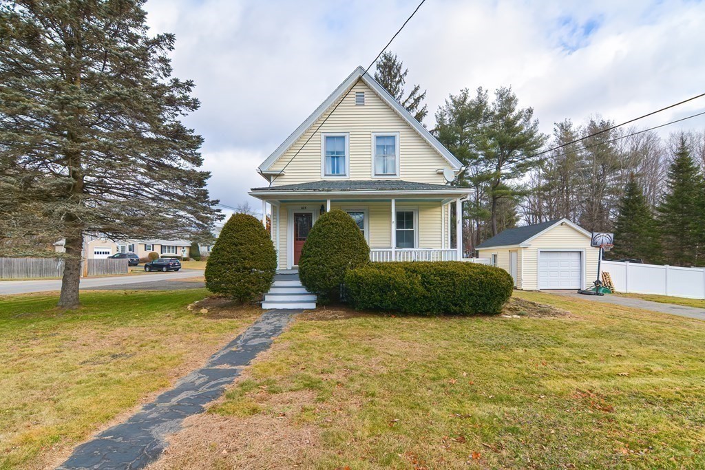 103 Maple Avenue Rutland, MA 01543 - Photo 33 of 42 a view of a house with a yard and sitting area