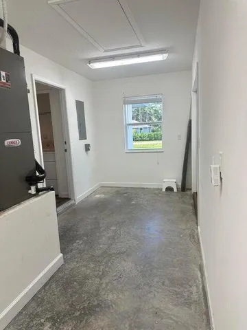 an empty room with windows