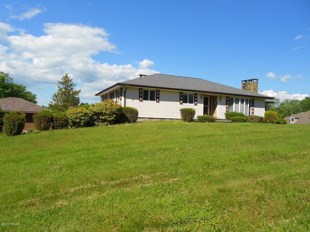 369 Roemerville Road Greentown, PA 18426 - Photo 6 of 45 a view of a house with a big yard