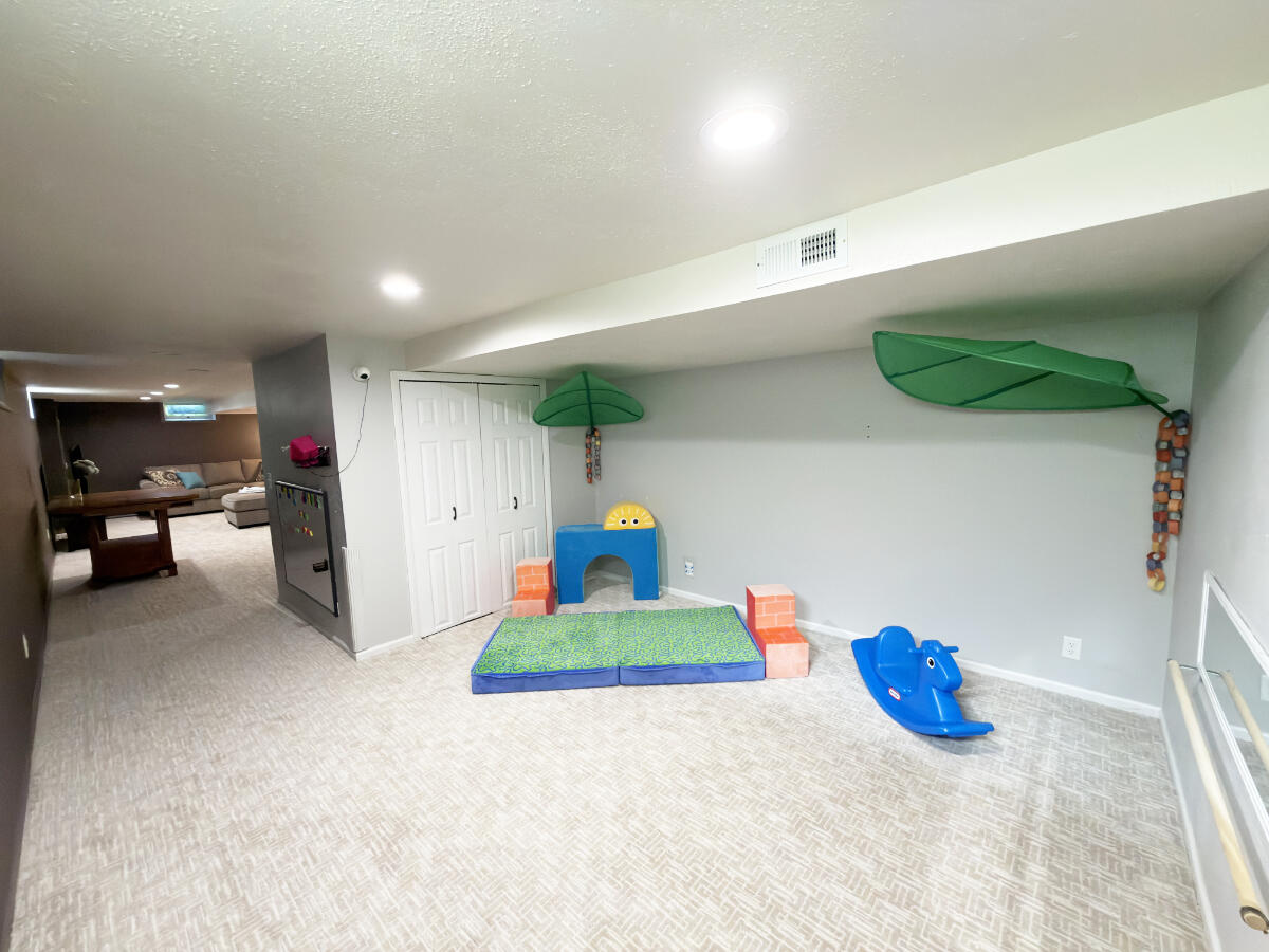 W240N4035 Swan Road Pewaukee, WI 53072 - Photo 27 of 27 Lower Level Den / Playroom