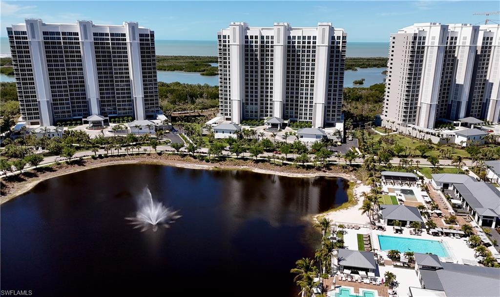 13945 Old Coast Road, Unit 1606 Naples, FL 34110 - Photo 30 of 35 a view of a city with tall buildings