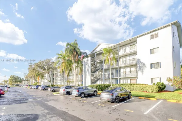 a cars parked in front of a building