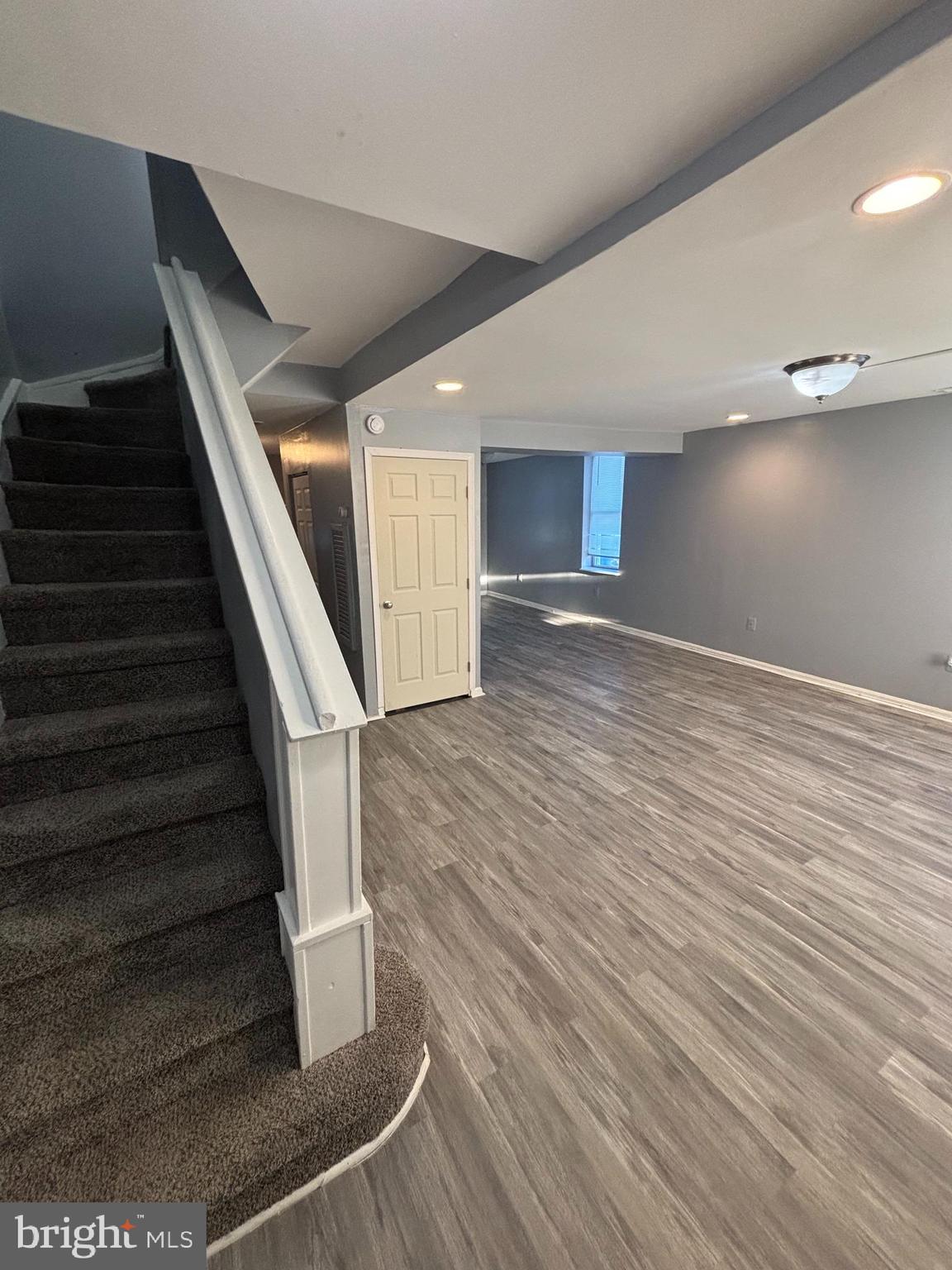 1501 North Payson Street Baltimore, MD 21217 - Photo 2 of 13 a view of entryway and hall with wooden floor