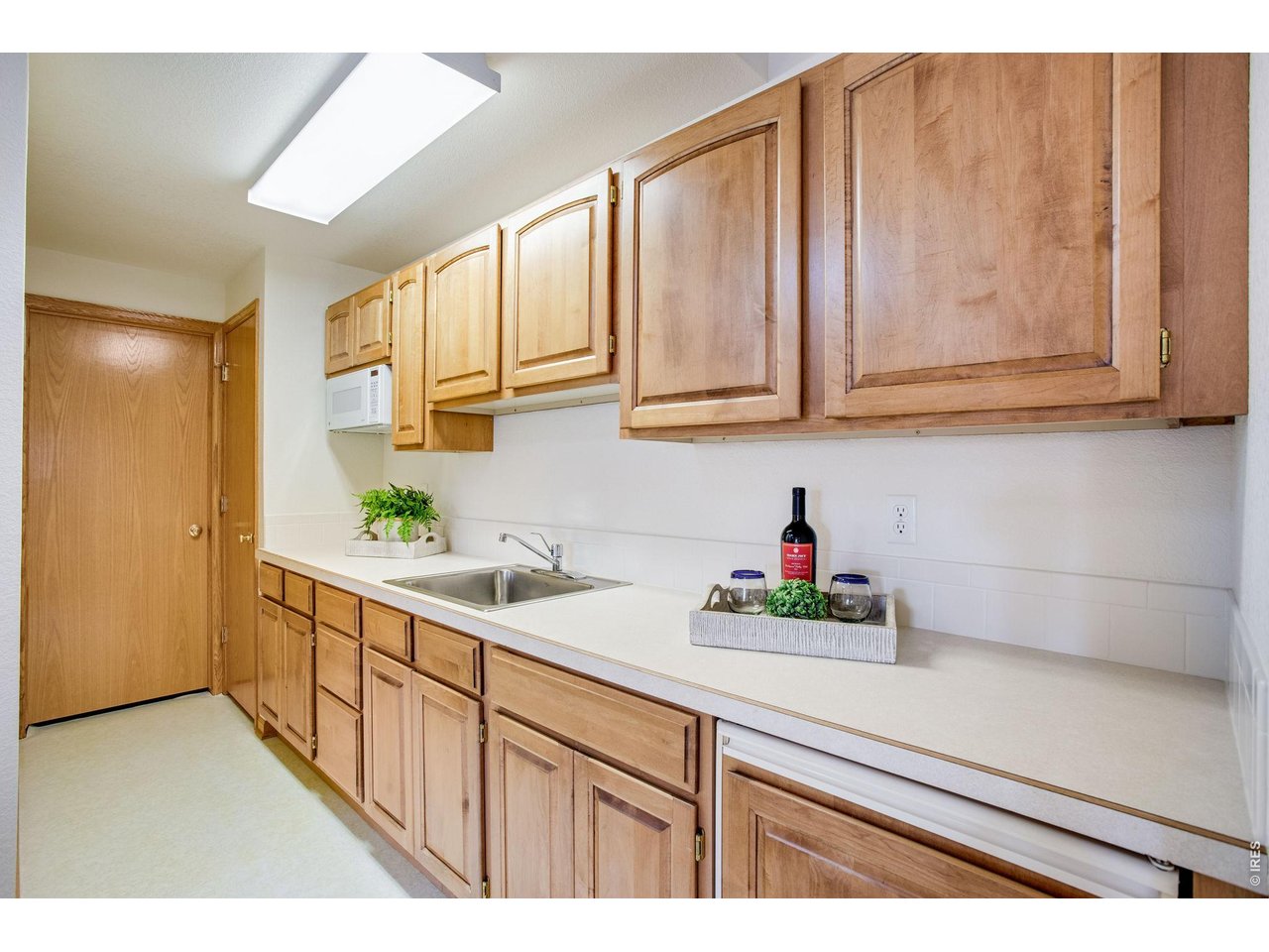 6230 Eagle Ridge Court Fort Collins, CO 80525 - Photo 48 of 50 Basement Wet Bar
