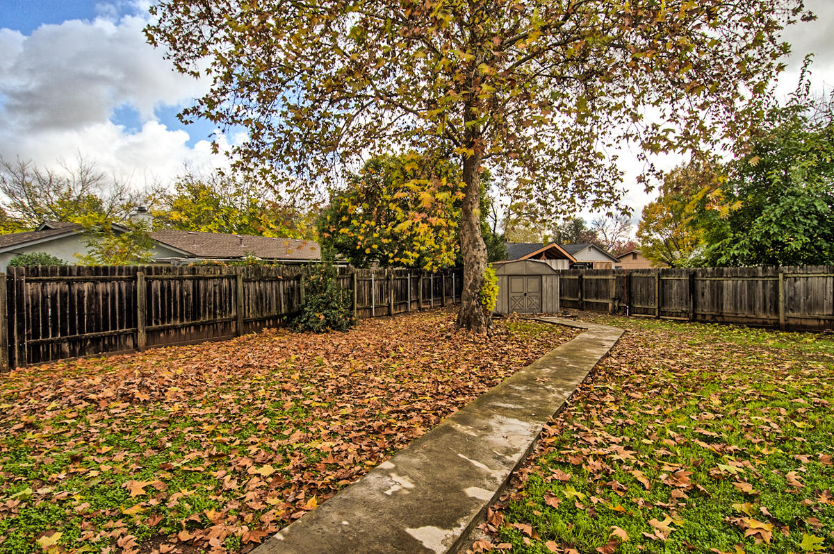 1077 Woodside Meadows Road Redding, CA 96002 - Photo 23 of 25 Sidewalk to Storage Shed
