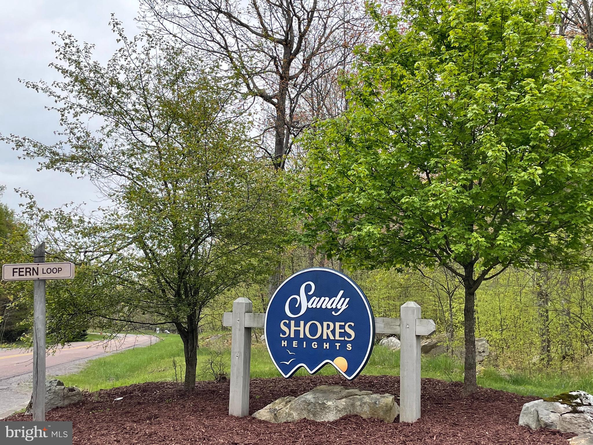 40 Fern Loop Oakland, MD 21550 - Photo 2 of 28 a close up of a street sign