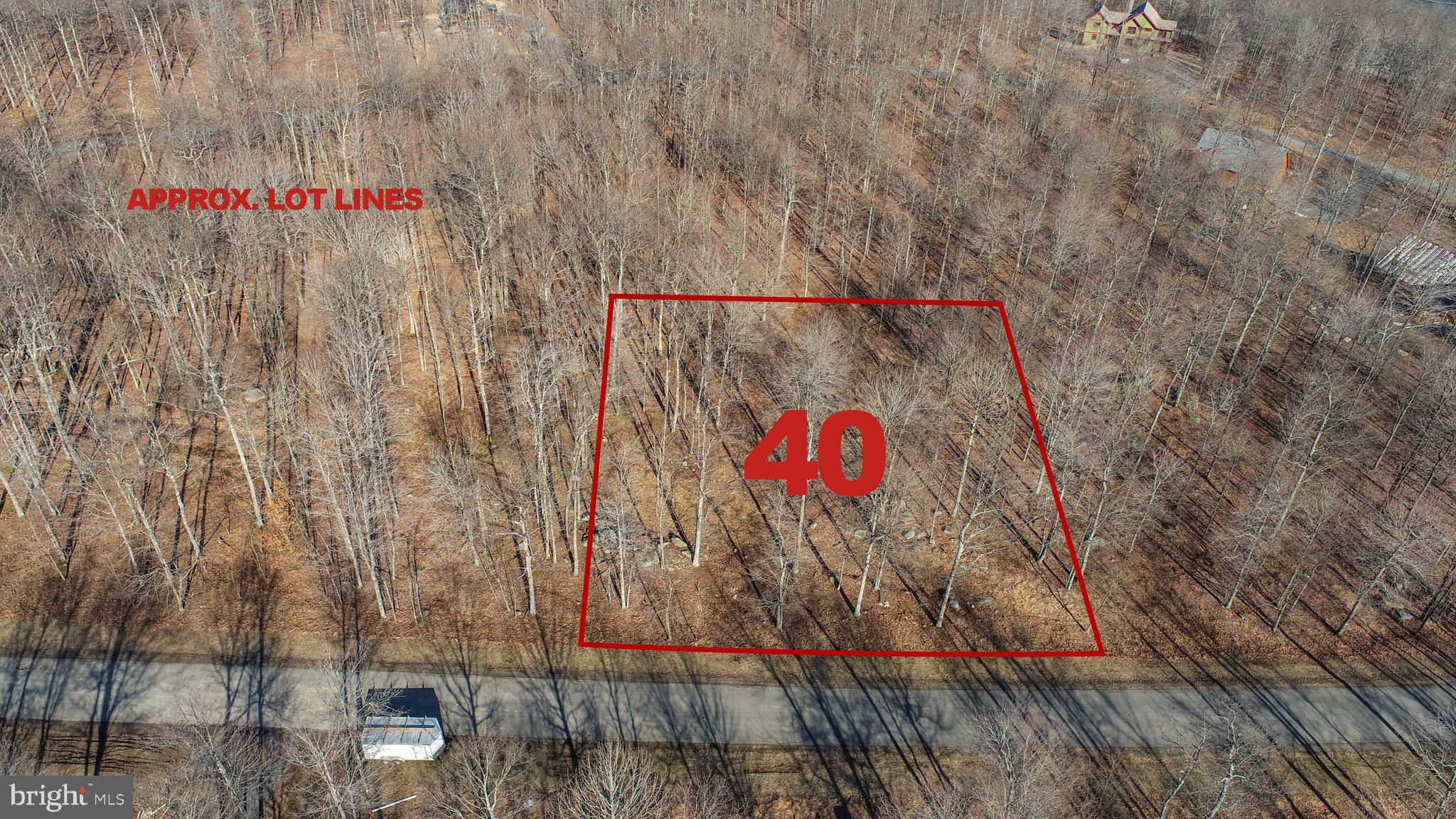 40 Fern Loop Oakland, MD 21550 - Photo 3 of 28 a sign that is on a brick wall