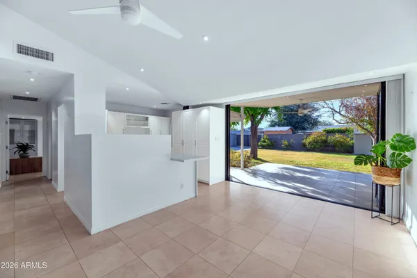 a view of a living room and front door